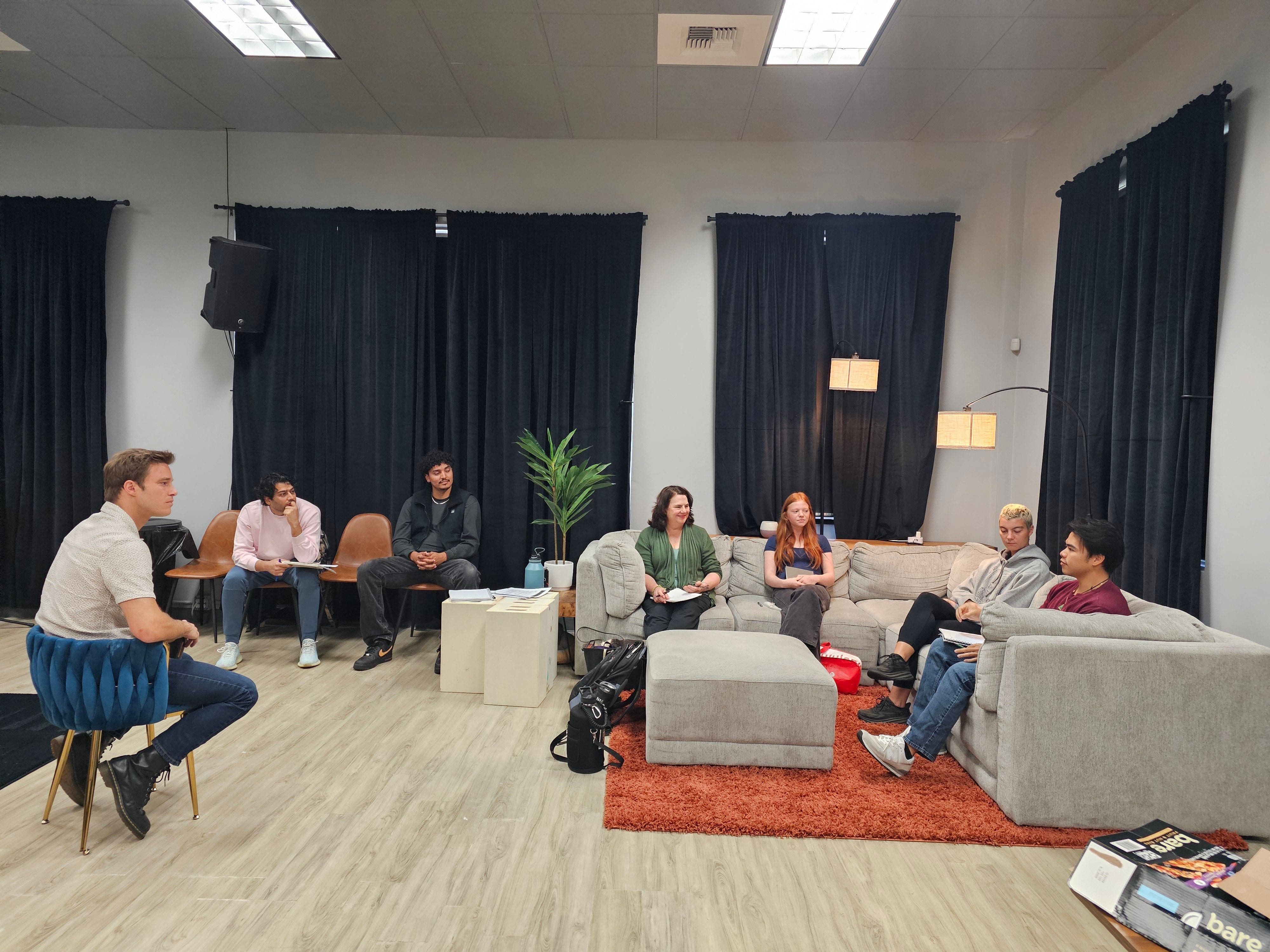 Actors seated in a circle during the Josh Plasse workshop on September 20, 2025.
