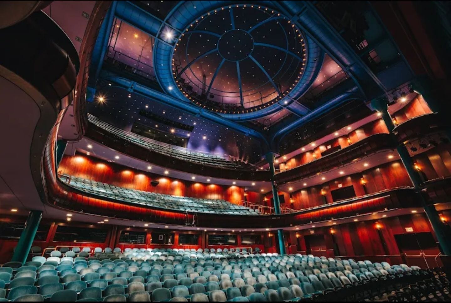 Ornate theatre interior prepared for a live event.